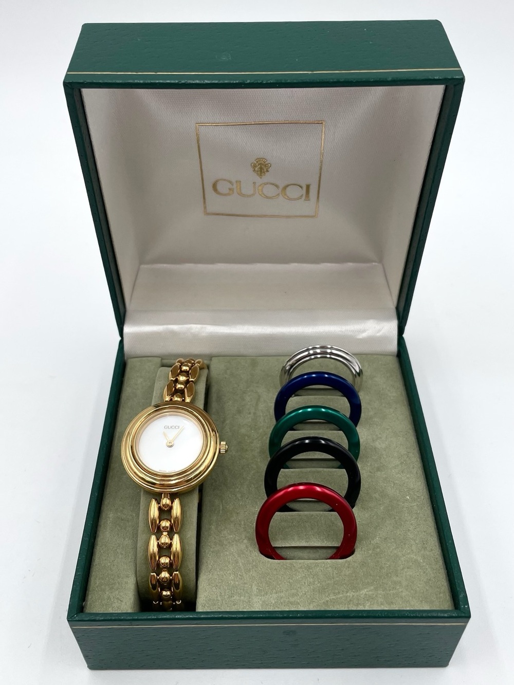 Gucci Gold Bracelet Watch with Interchangeable Colored Bezels